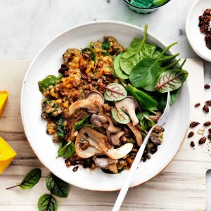 Pumpkin risotto with mushrooms and a seed sprinkle